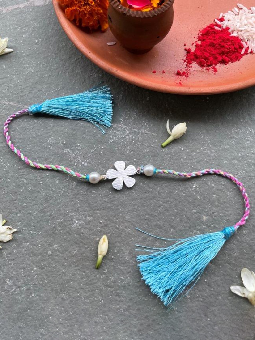 

Mitali Jain Blue Sterling Silver Fluer Rakhi