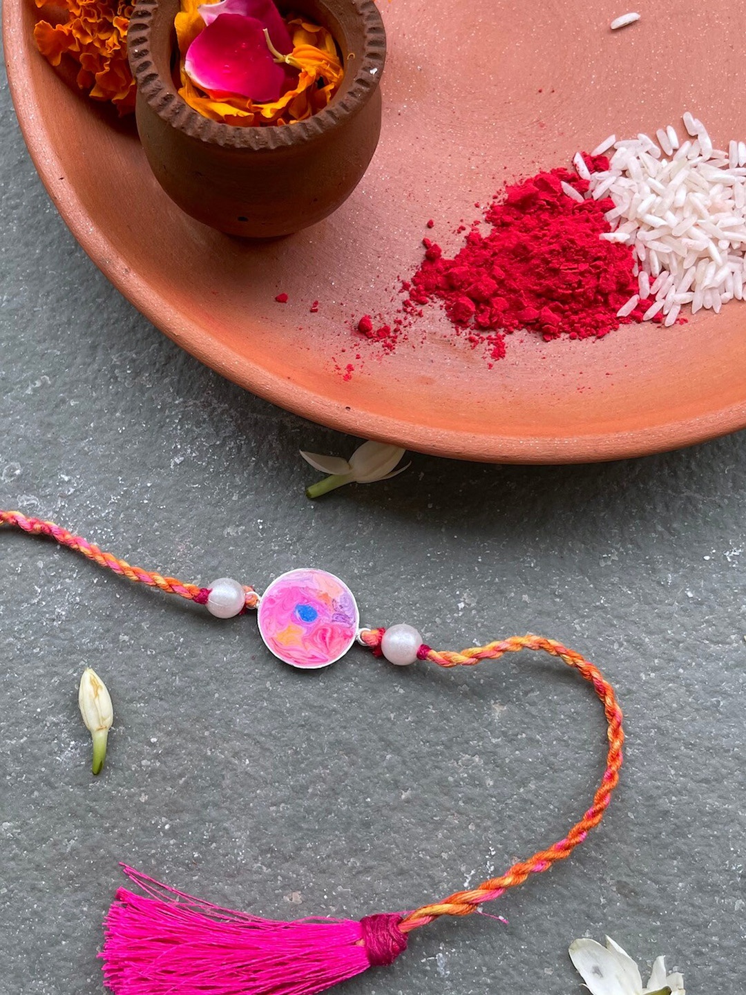 

Mitali Jain Silver-Toned & Pink Full Moon Rakhi