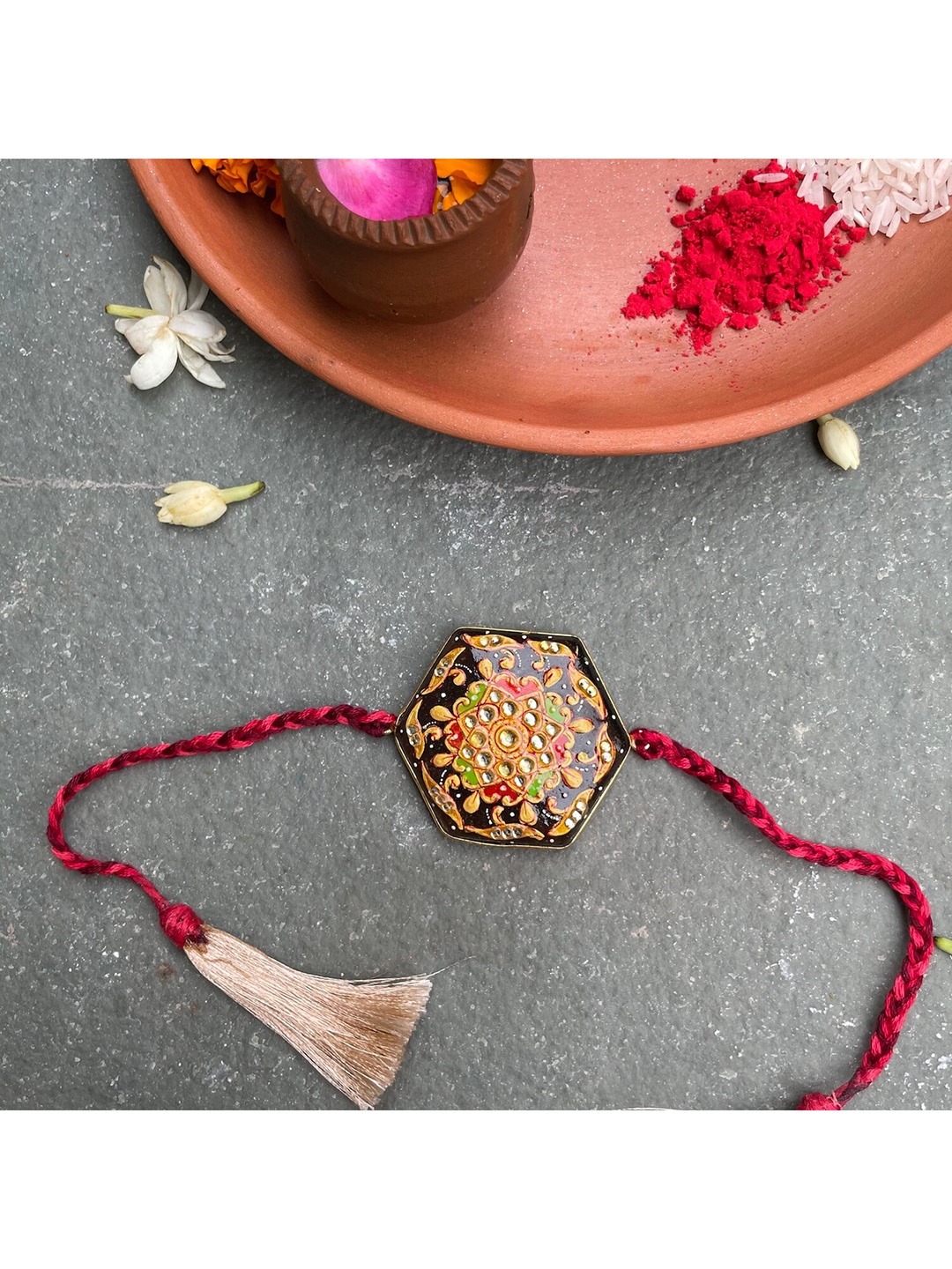 

Mitali Jain Brown and Cream-Colored Kundan Rakhi