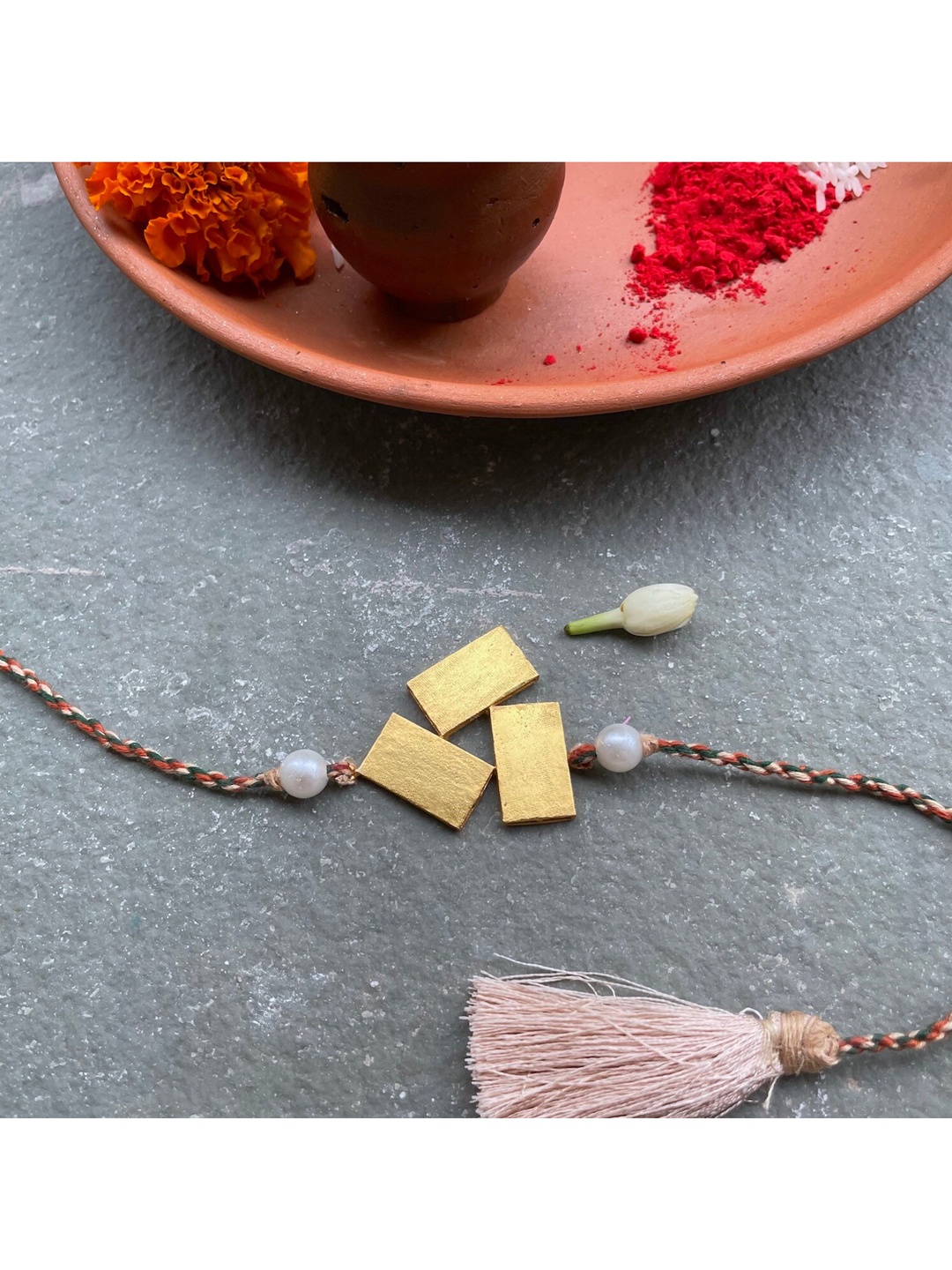 

Mitali Jain Gold-Toned Anarchy Rakhi