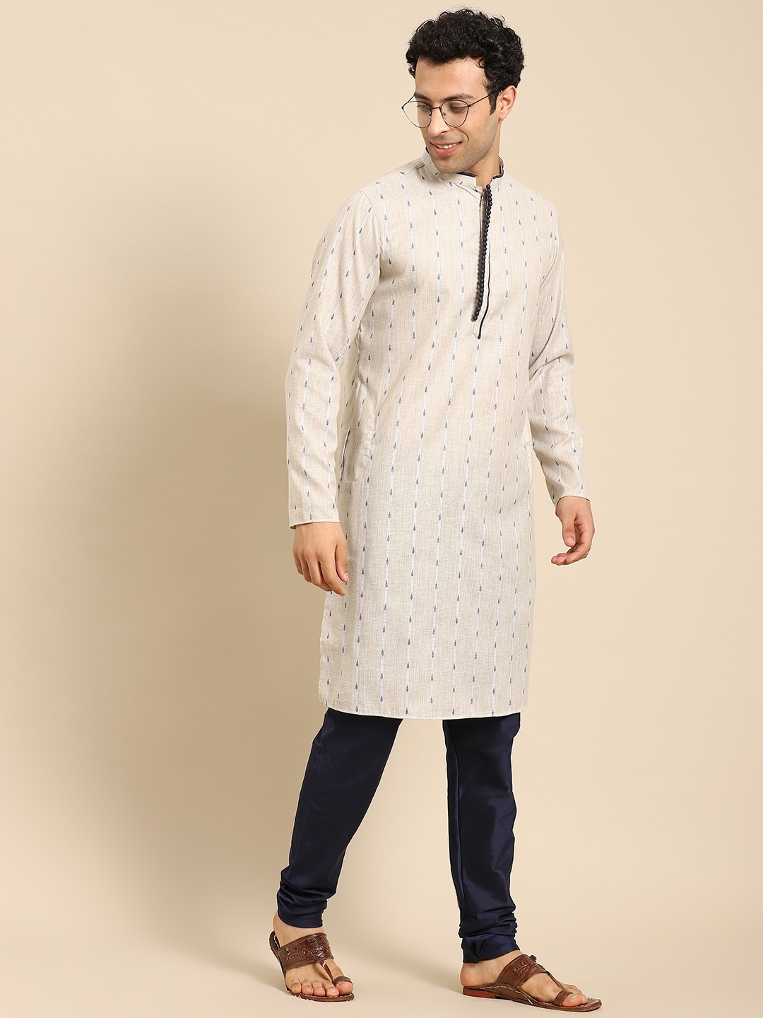 

Amodh by Kisah Men Off White & Navy Blue Striped Kurta with Churidar