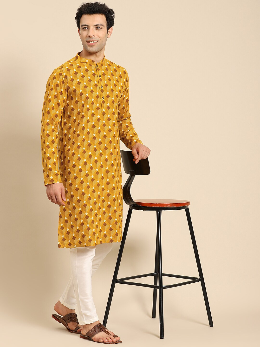 

Amodh by Kisah Men Yellow Printed Kurta with Churidar