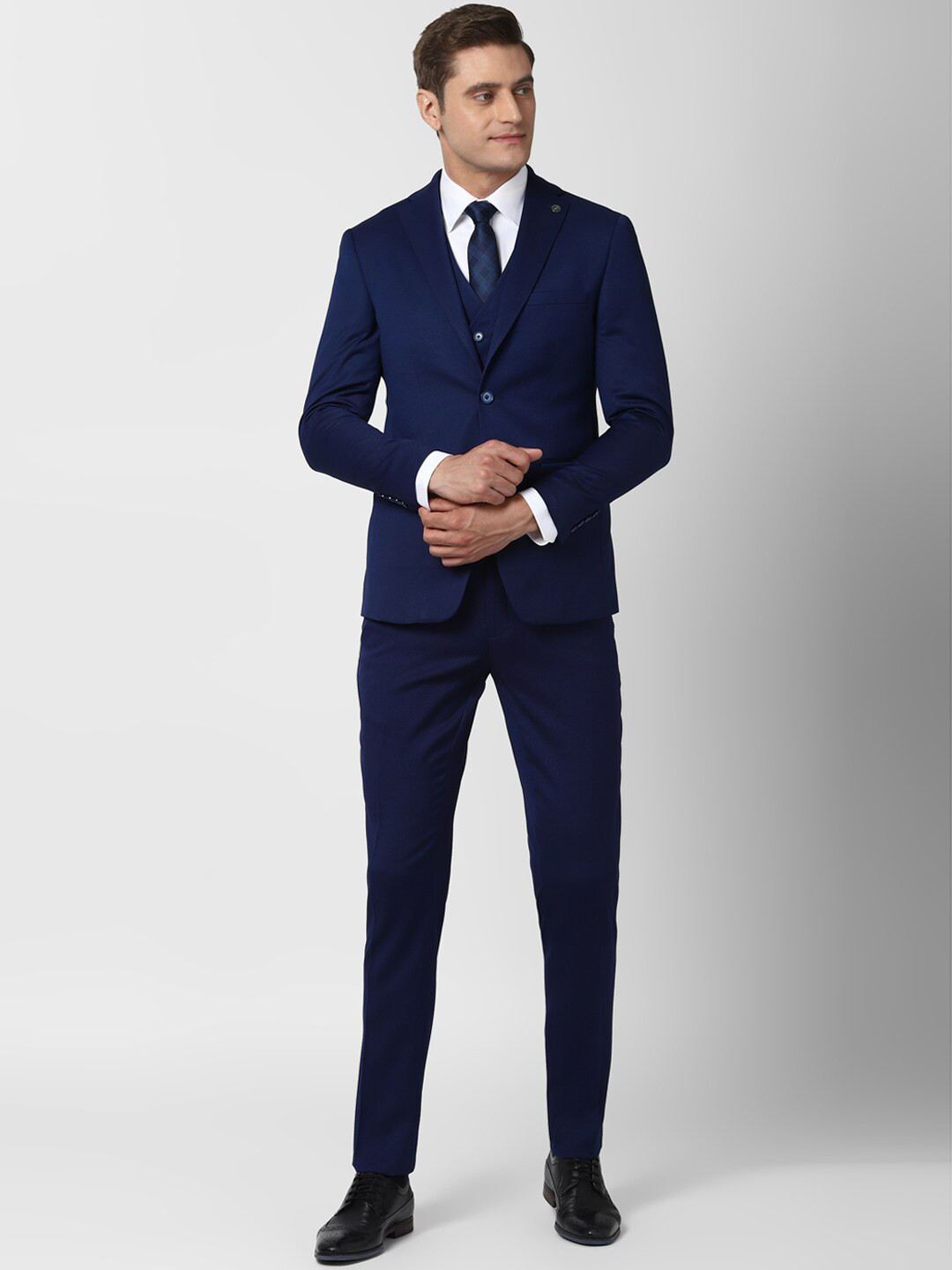 

Peter England Elite Men Navy Blue Solid Slim Fit Three Piece Suit