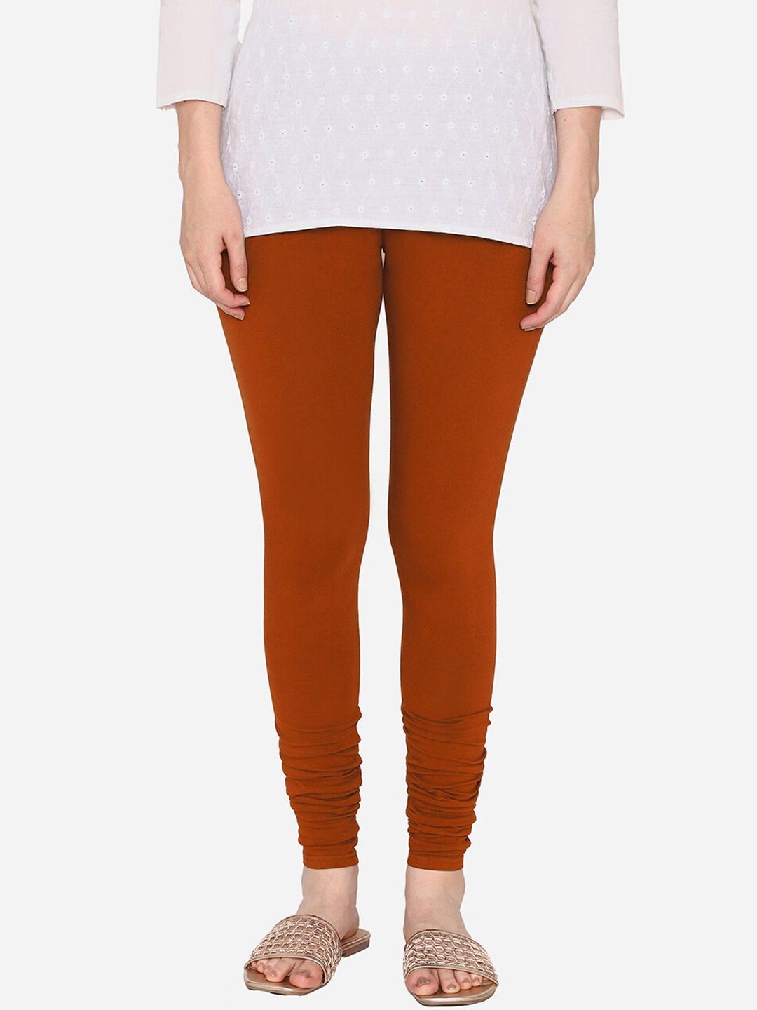 

Vami Women Rust Brown Solid Churidar-Length Leggings