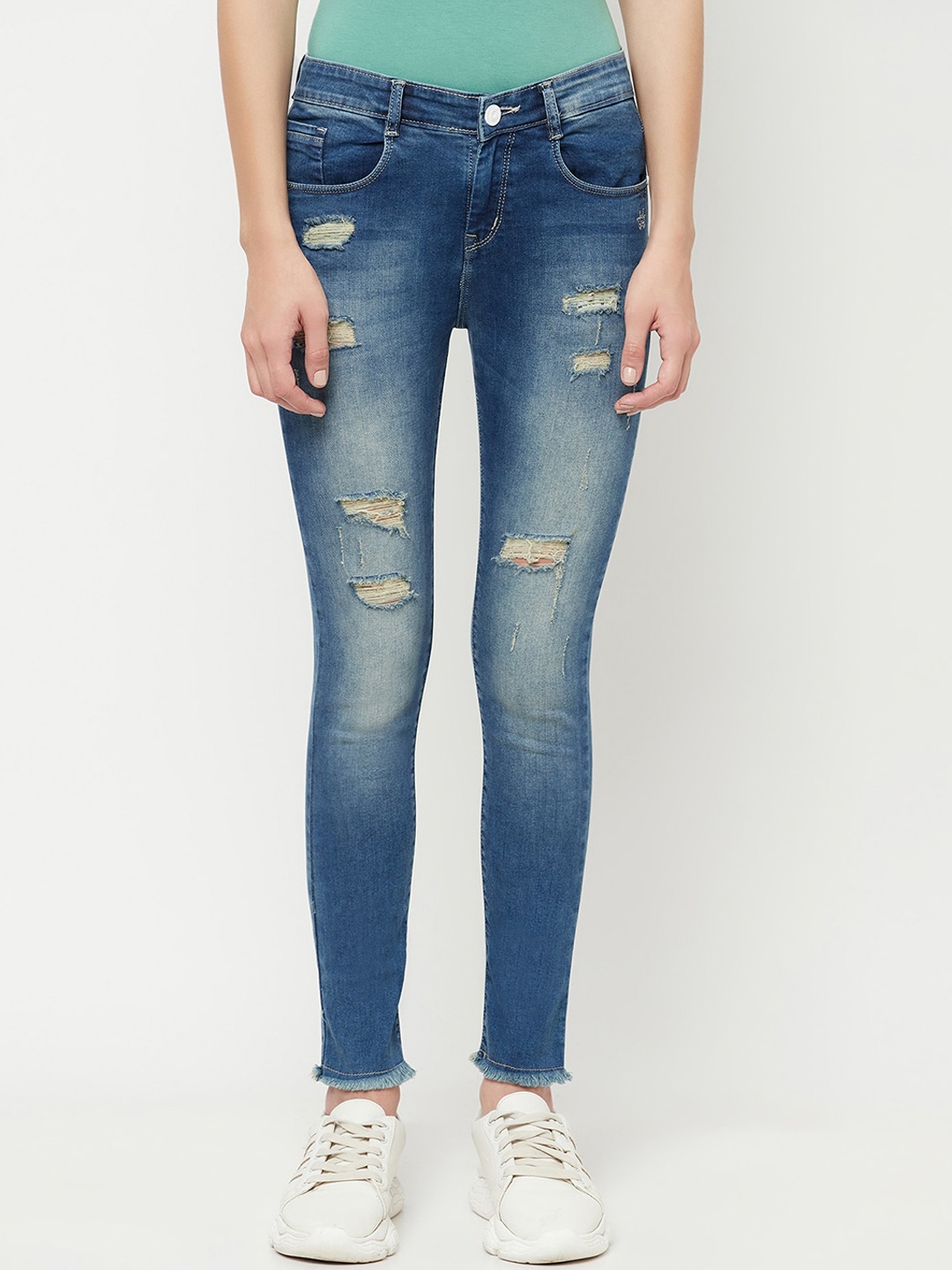 

Crimsoune Club Women Blue Skinny Fit Mildly Distressed Heavy Fade Stretchable Jeans