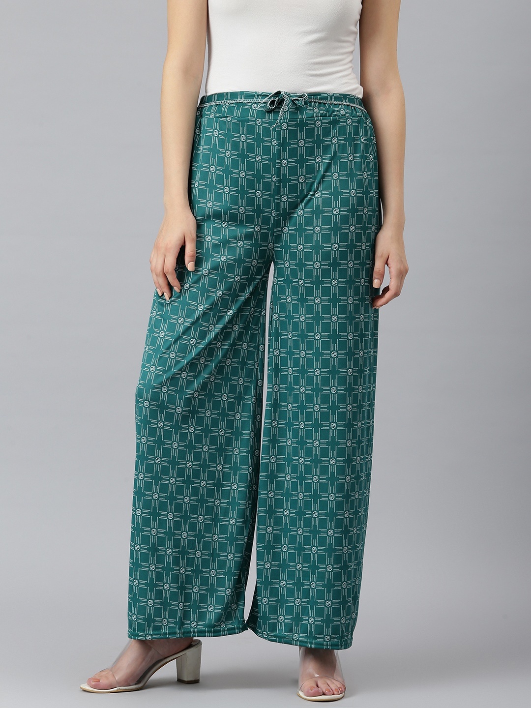 

Aarika Women Teal & White Pure Cotton Geometric Print Flared Ethnic Palazzos