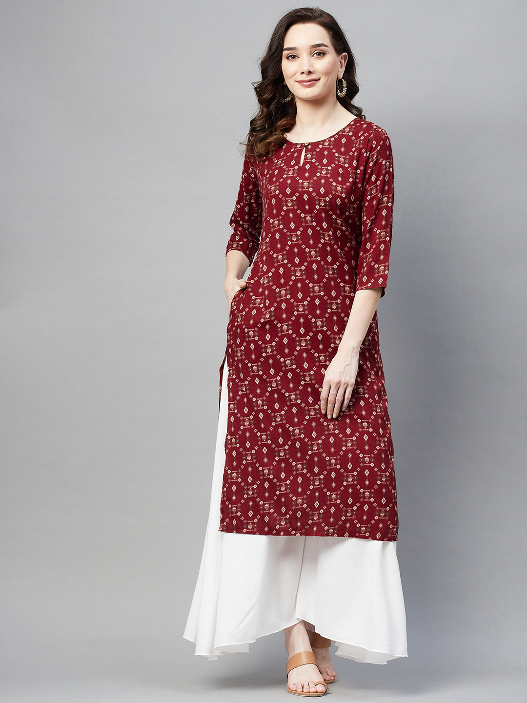 

Aarika Women Maroon Ethnic Motifs Printed Keyhole Neck Kurta