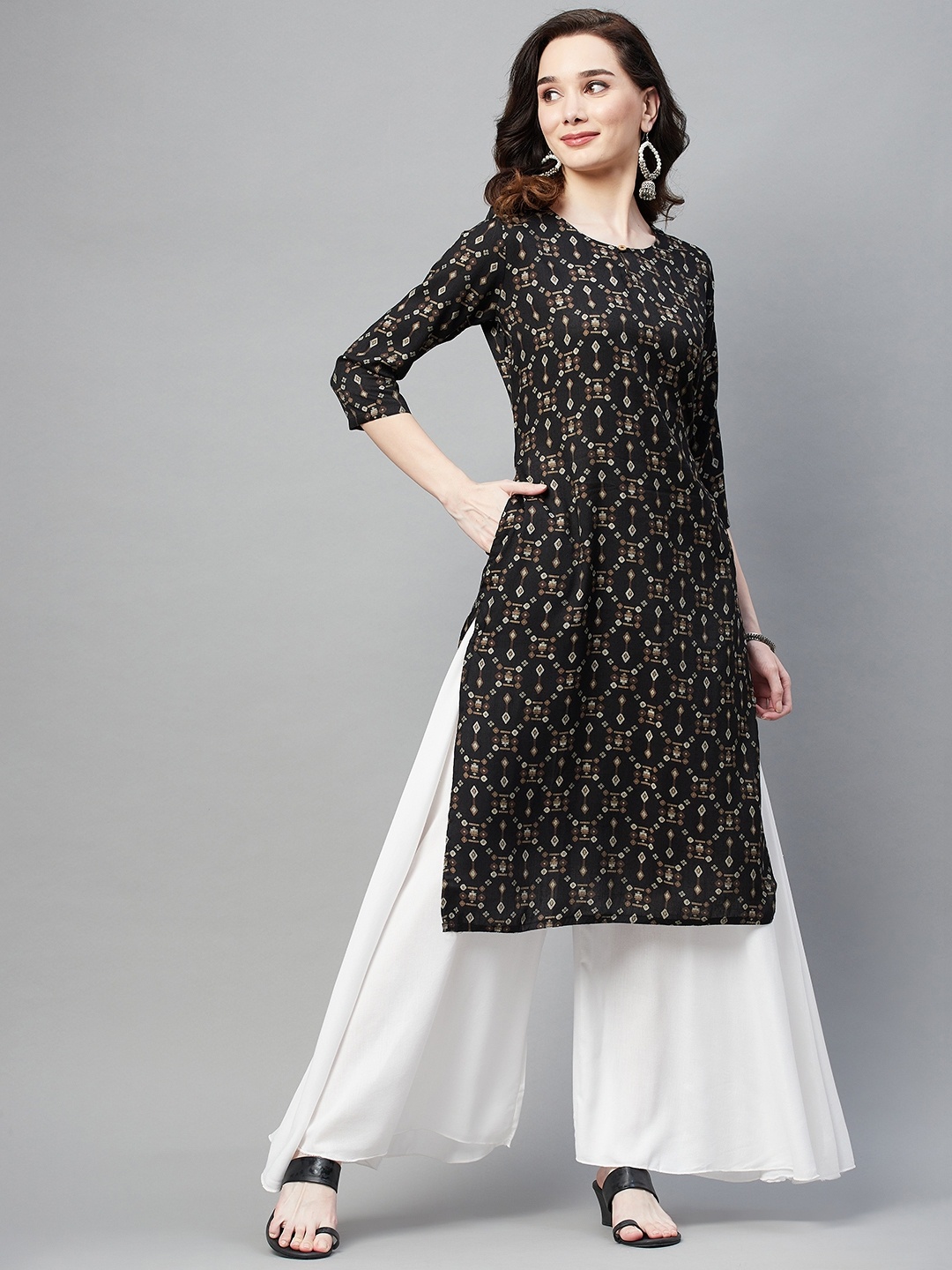 

Aarika Women Black & Beige Ethnic Motifs Printed Kurta