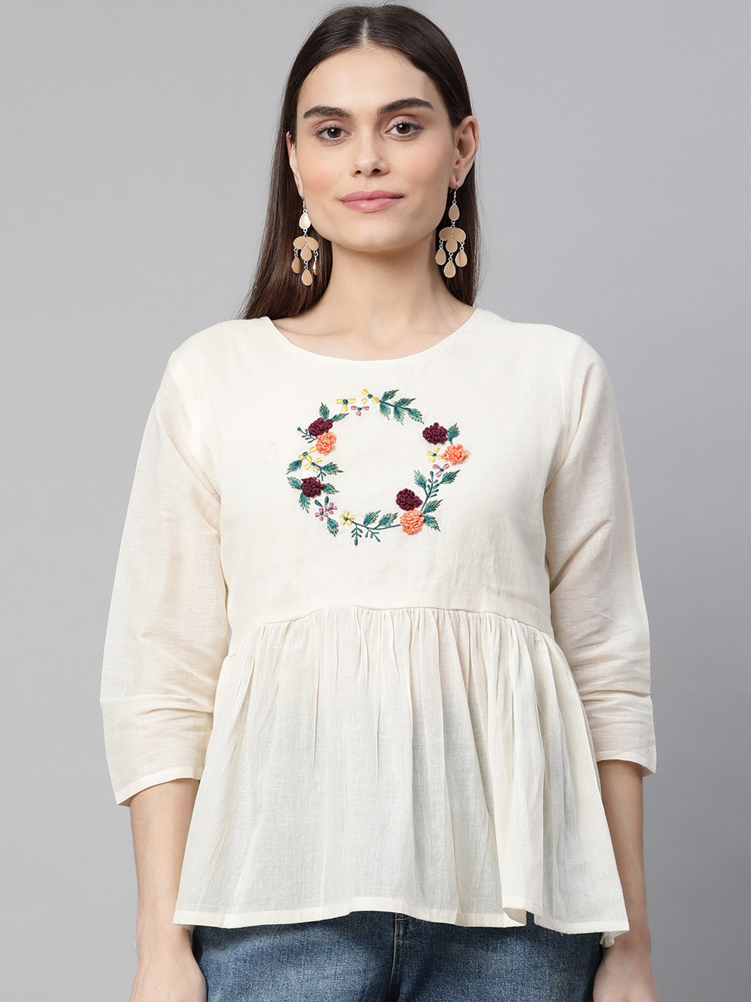

Aarika Off White Pure Cotton Floral Embroidered A-line Top