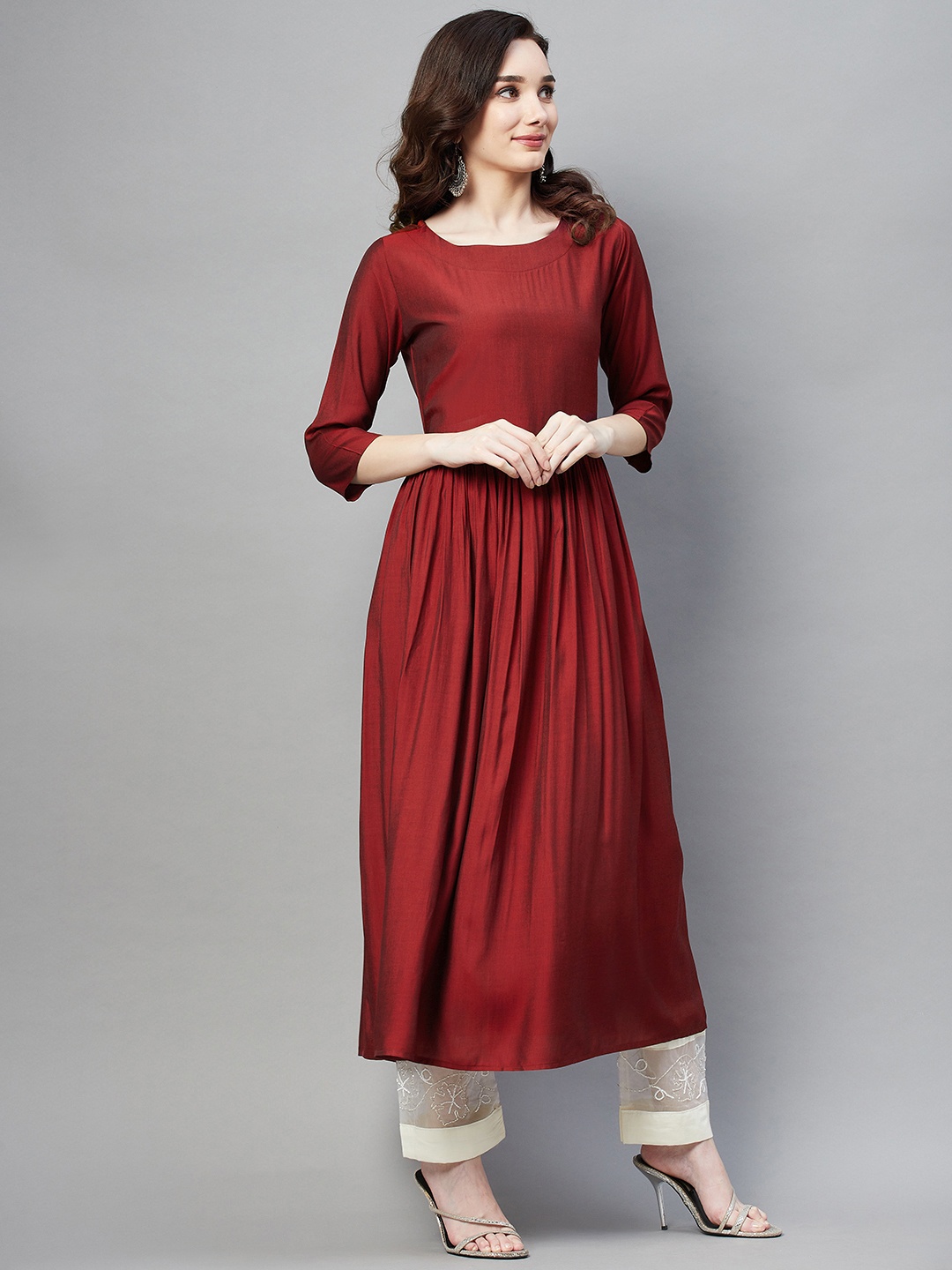 

Aarika Women Maroon Solid Kurta