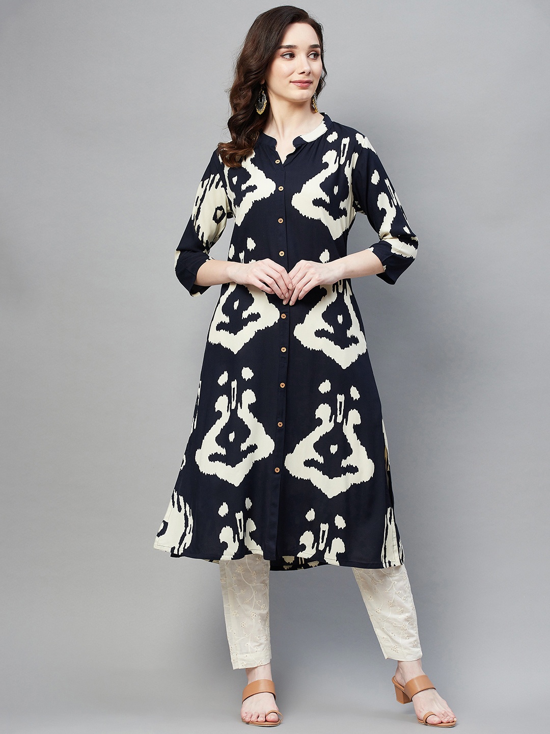 

Aarika Women Navy Blue & Off White Pure Cotton Ethnic Motifs Printed Kurta