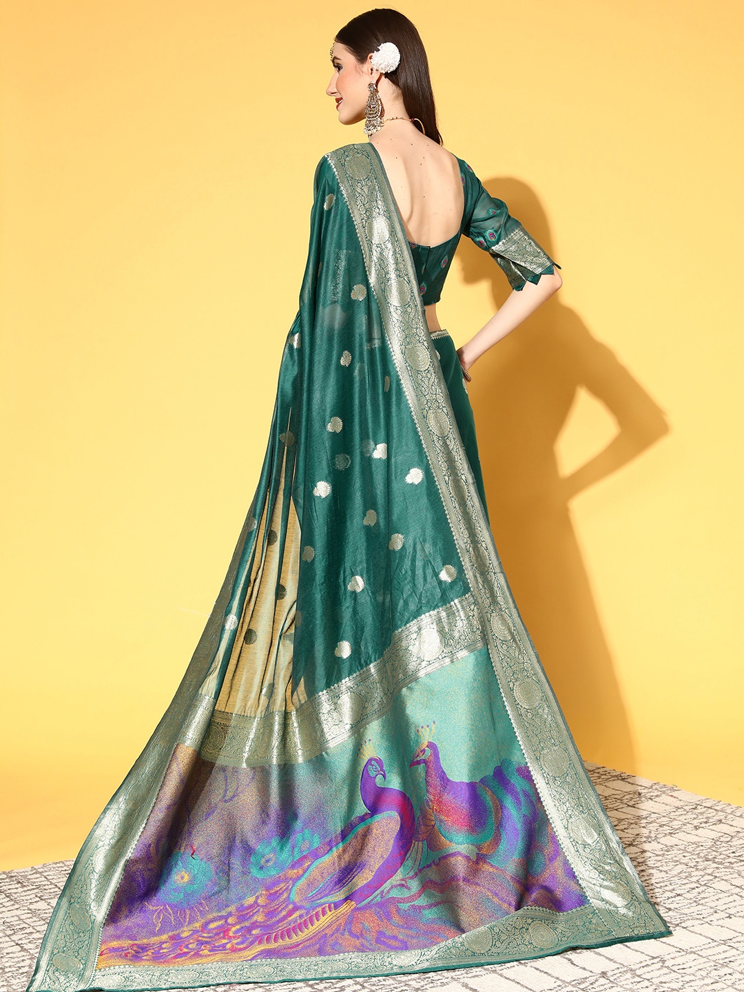 

Saree mall Teal Green Ethnic Motifs Silk Blend Sarees