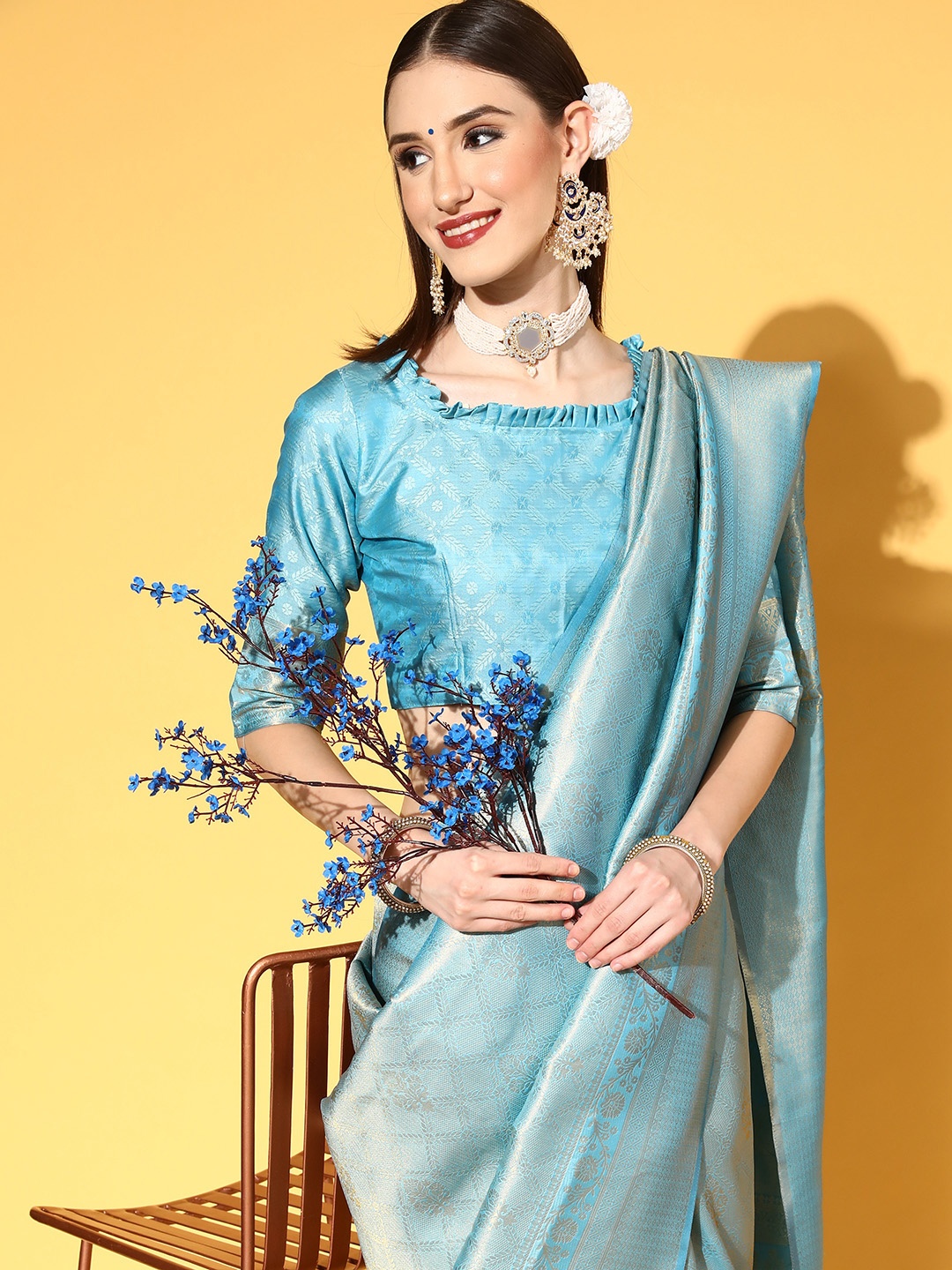 

Saree mall Turquoise Blue & Golden Ethnic Motifs Silk Blend Sarees