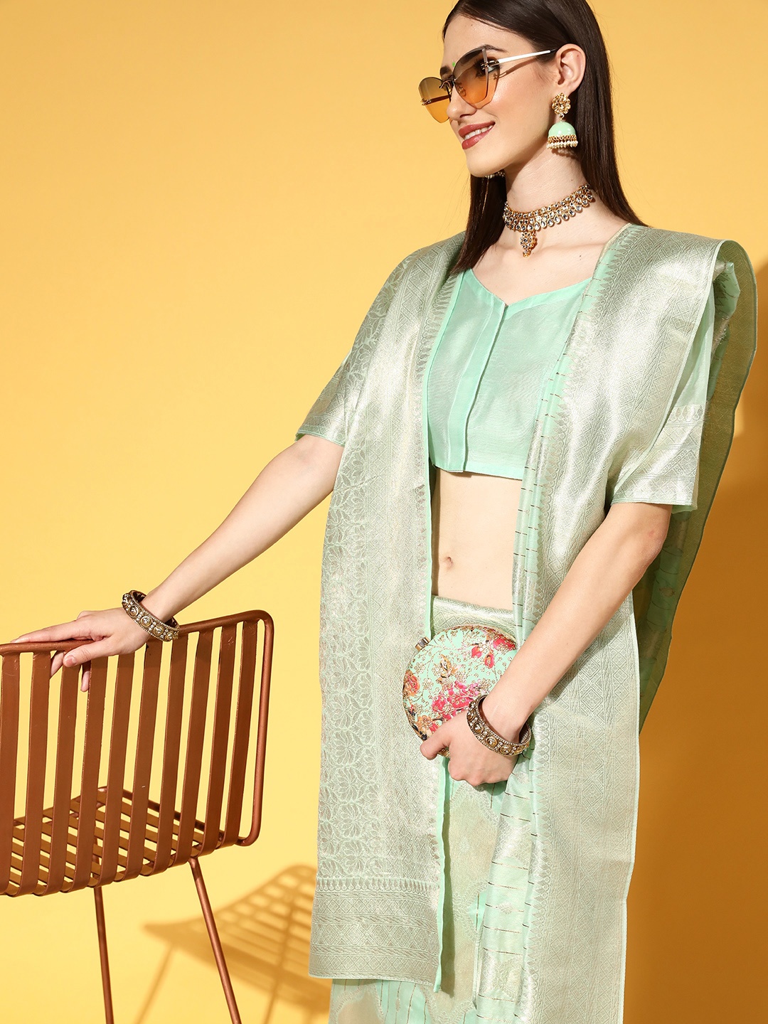 

Saree mall Sea Green & Golden Ethnic Motifs Silk Blend Sarees