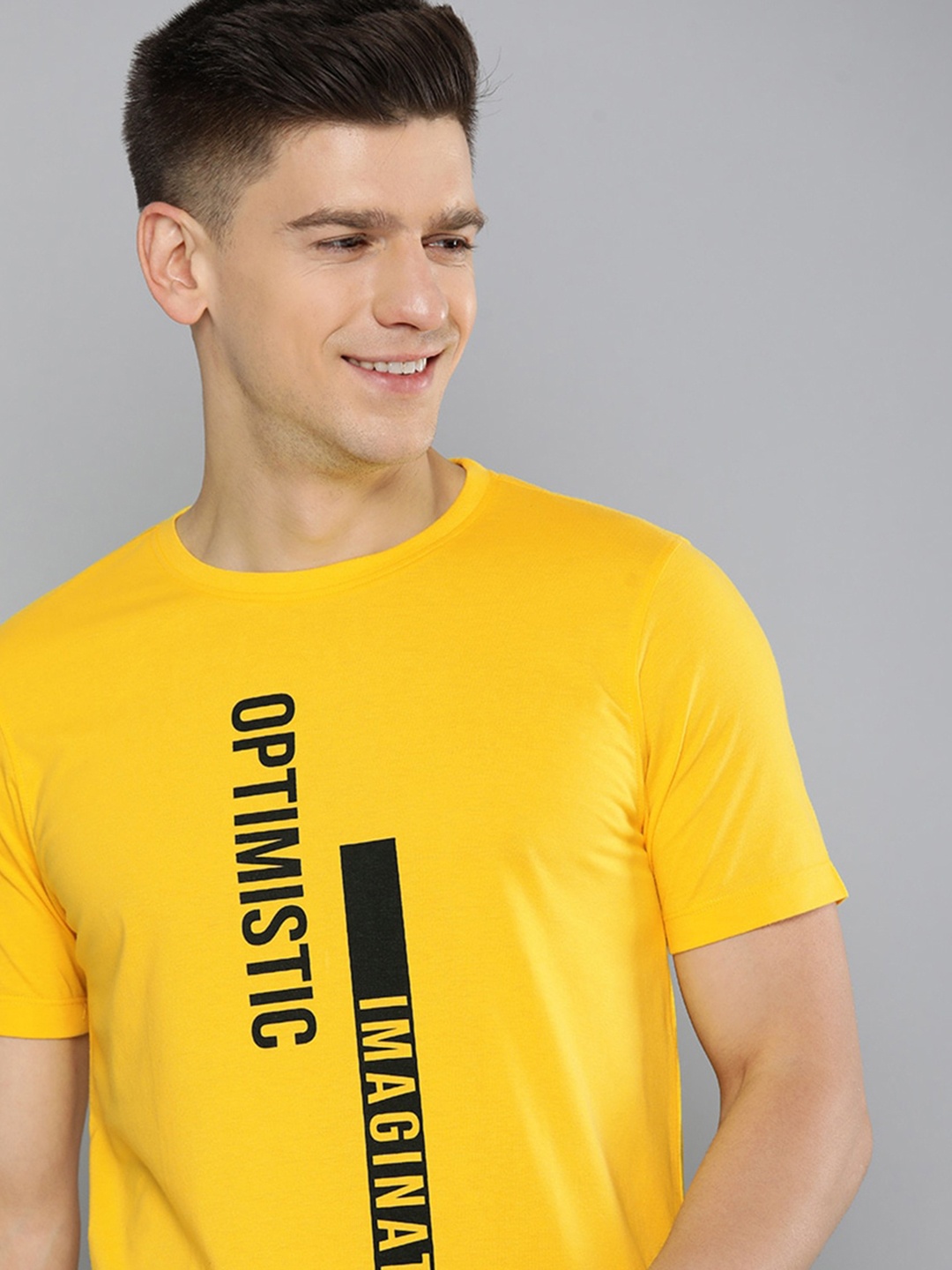 

Mast & Harbour Men Yellow & Black Typography Printed T-shirt