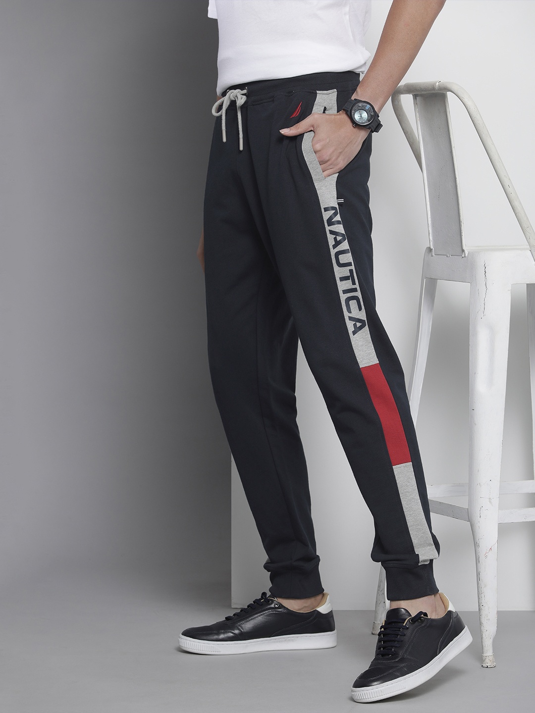 

Nautica Men Navy Blue Solid Joggers With Printed Side Logo