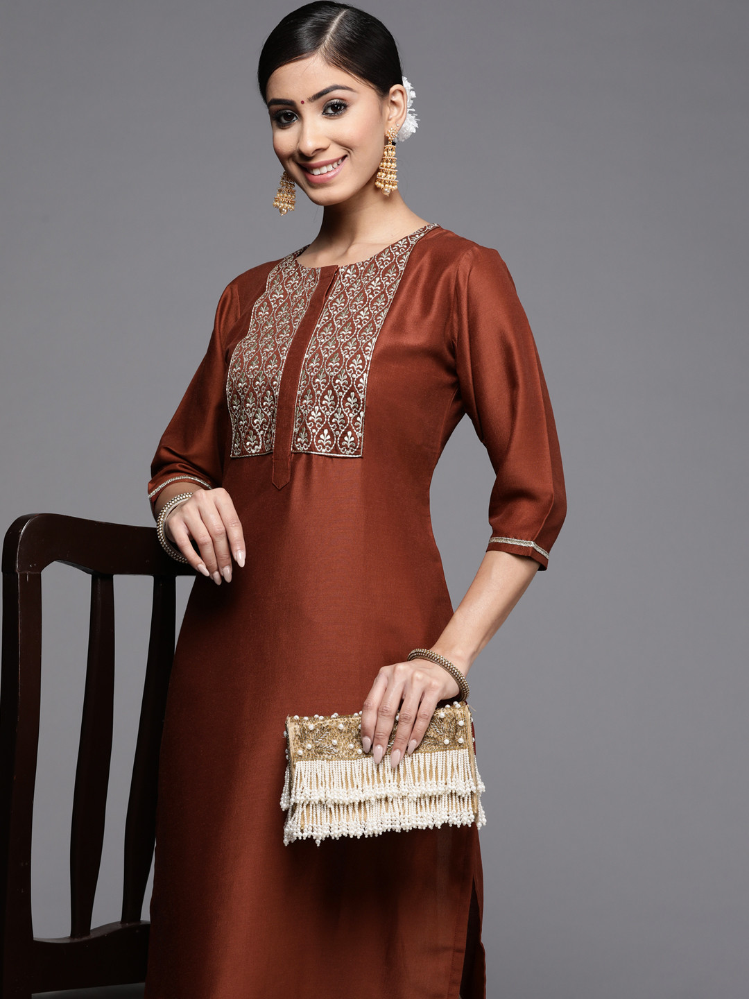 

Libas Women Rust & Silver Ethnic Motifs Embroidered Kurta