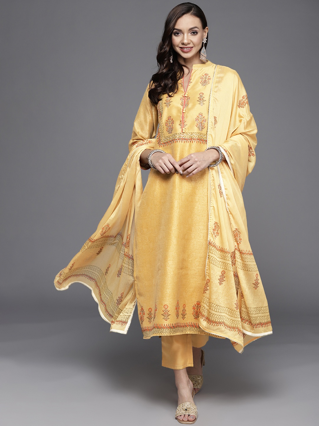 

Libas Women Yellow Floral Printed Chanderi Silk Kurta with Trousers & Dupatta