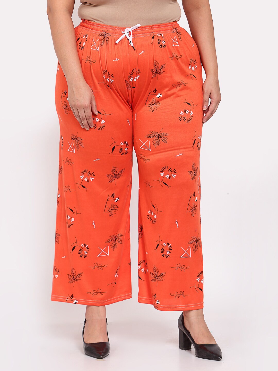 

KLOTTHE Women Plus Size Orange & Black Floral Printed Palazzos