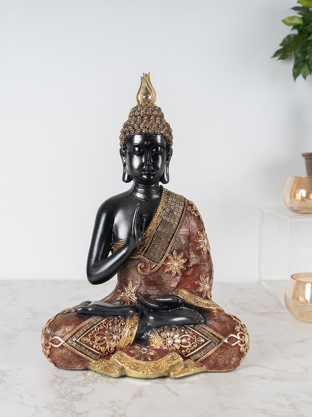 

HomeTown Gold-Colored & Black Buddha Figurine Showpiece