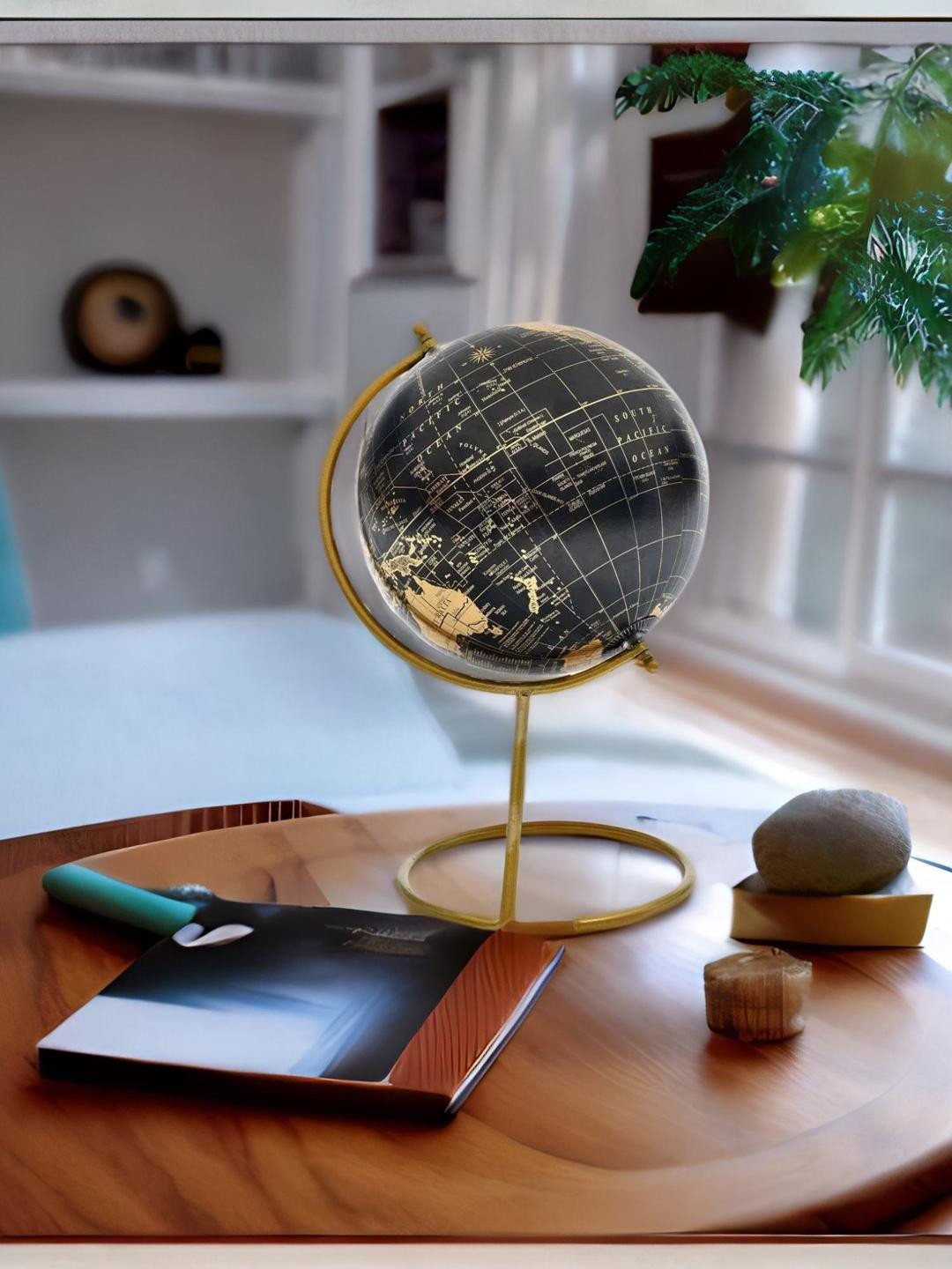 

Athome by Nilkamal Gold-Toned & Black Printed Atlas Nova World Globe Showpieces