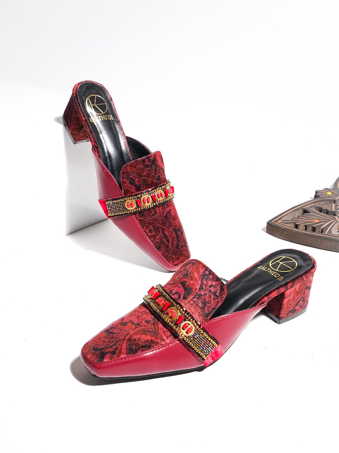 

KALTHEOS Maroon Embellished Suede Party Block Mules