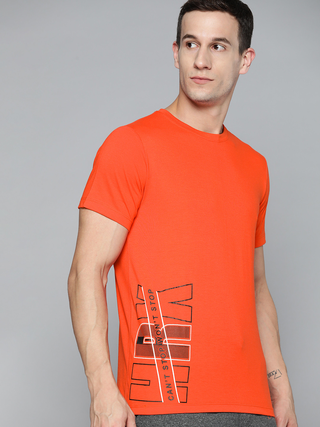 

HRX By Hrithik Roshan Lifestyle Men Oxy Fire Bio-Wash Brand carrier Tshirts, Orange