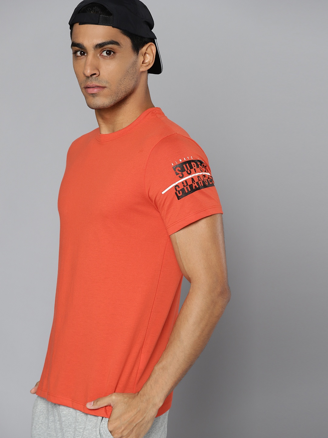 

HRX By Hrithik Roshan Lifestyle Men Oxy Fire Bio-Wash Brand carrier Tshirt, Orange