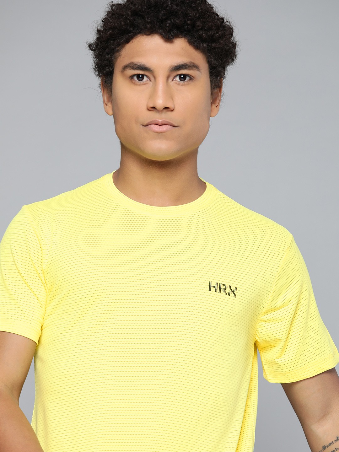 

HRX By Hrithik Roshan Running Men Neon Lime Antimicrobial Brand Carrier Tshirts, Yellow