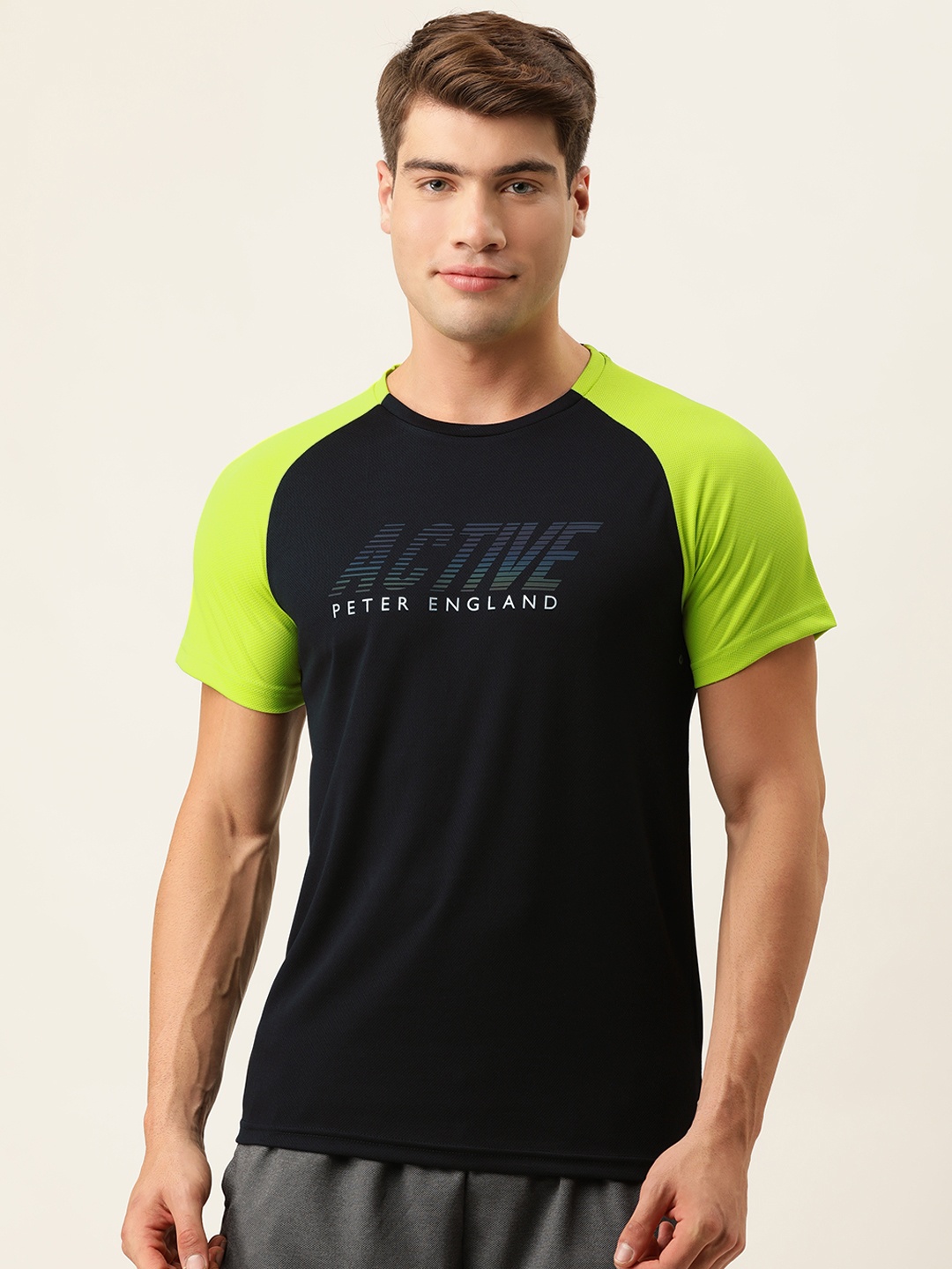 

Peter England Men Black Brand Logo Printed Dry Tech Slim Fit T-shirt