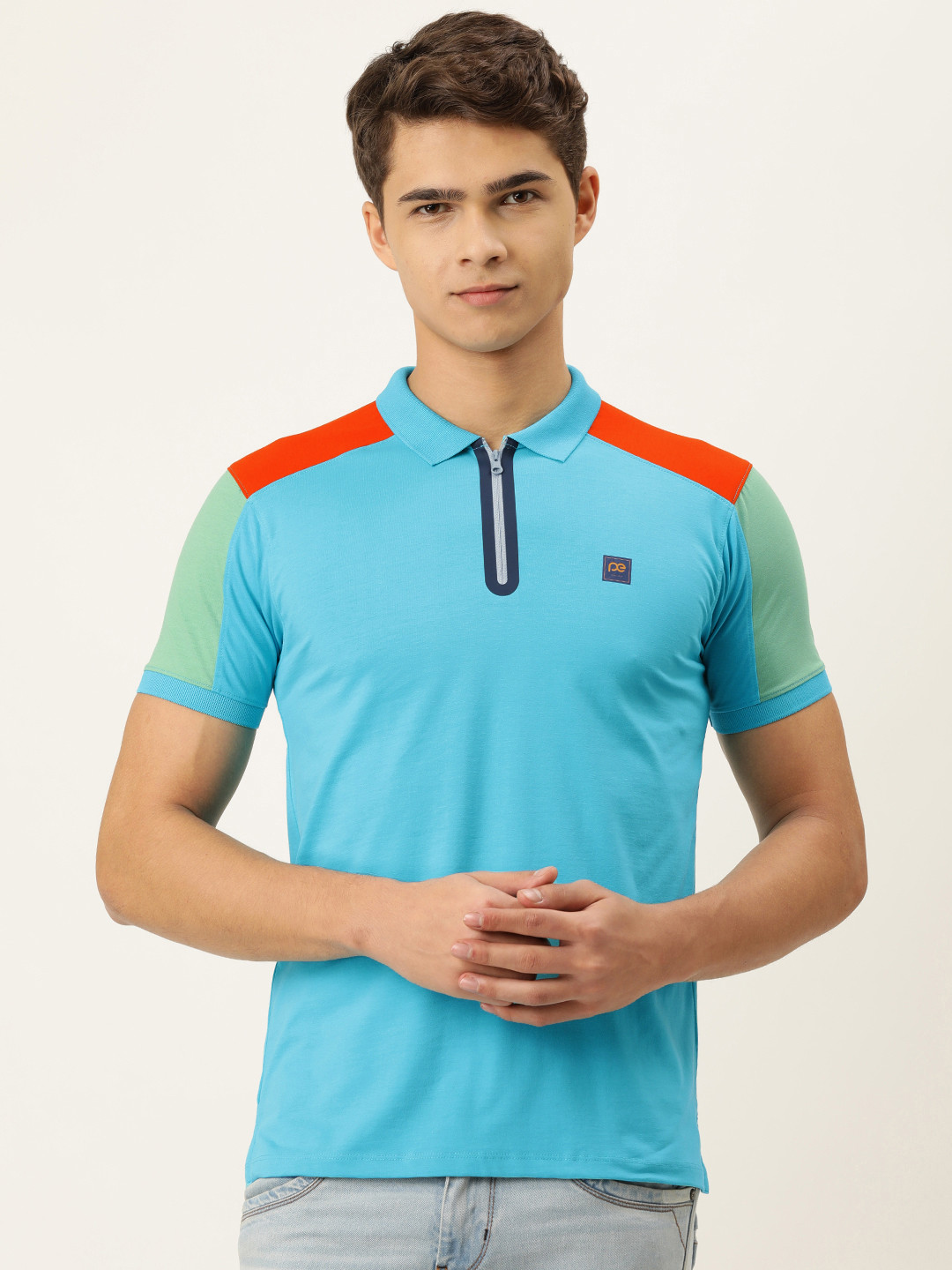 

Peter England Men Turquoise Blue Colourblocked Polo Collar T-shirt