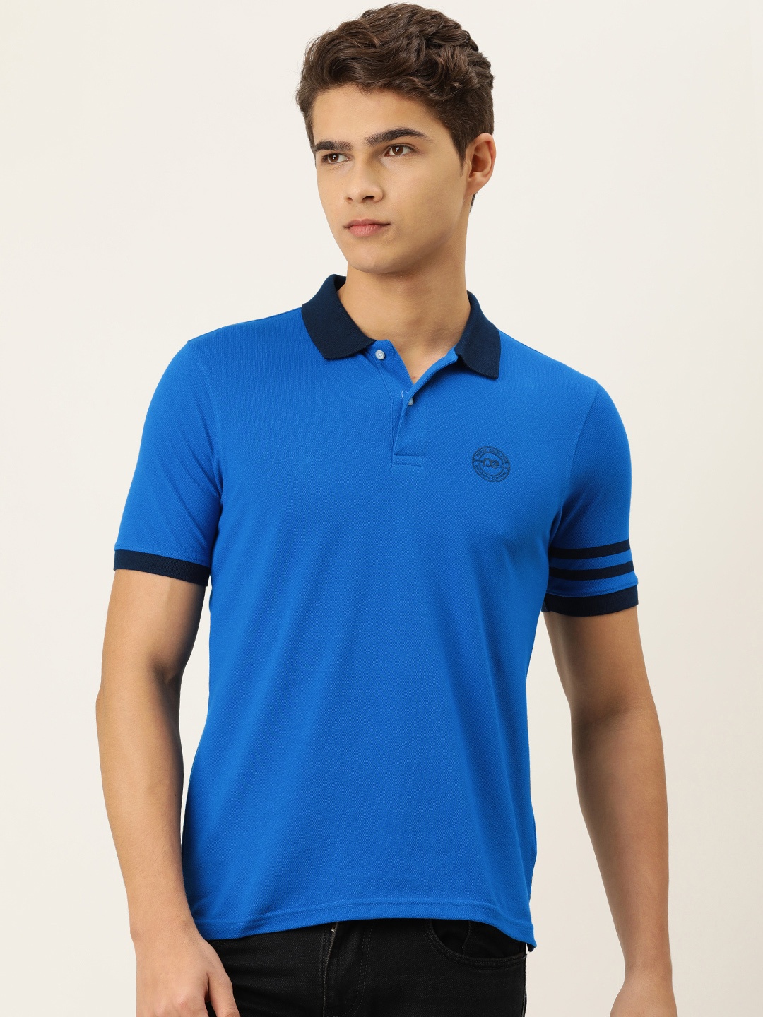 

Peter England Men Blue Solid Polo Collar T-shirt