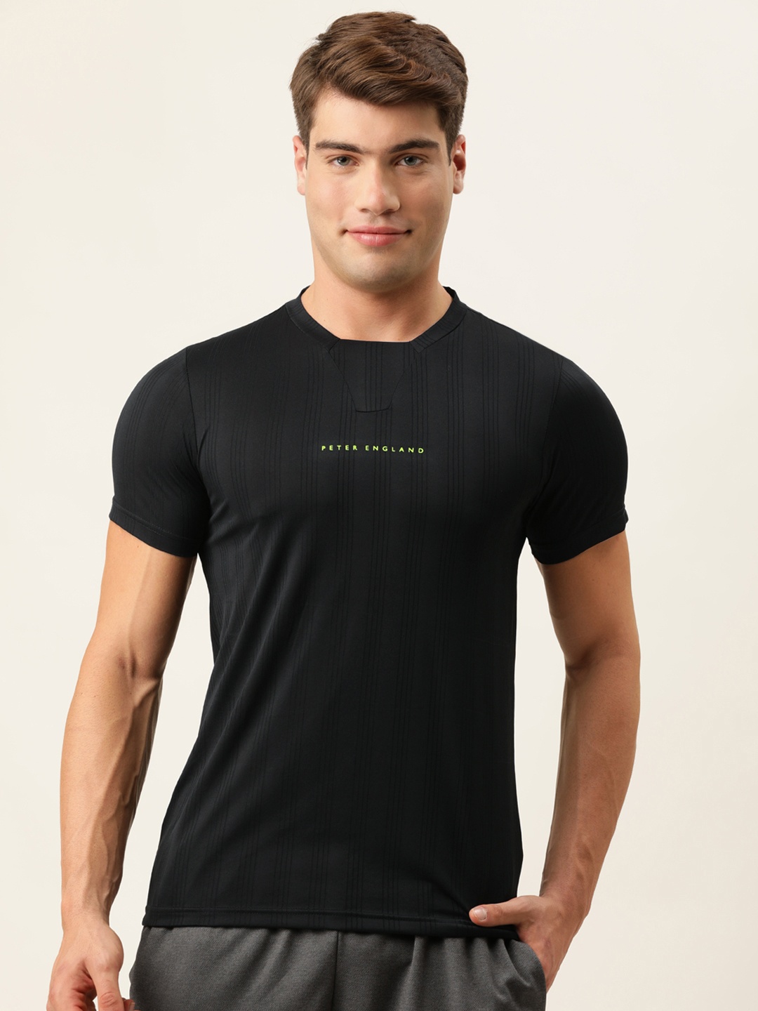 

Peter England Men Black Self-Striped Slim Fit T-shirt