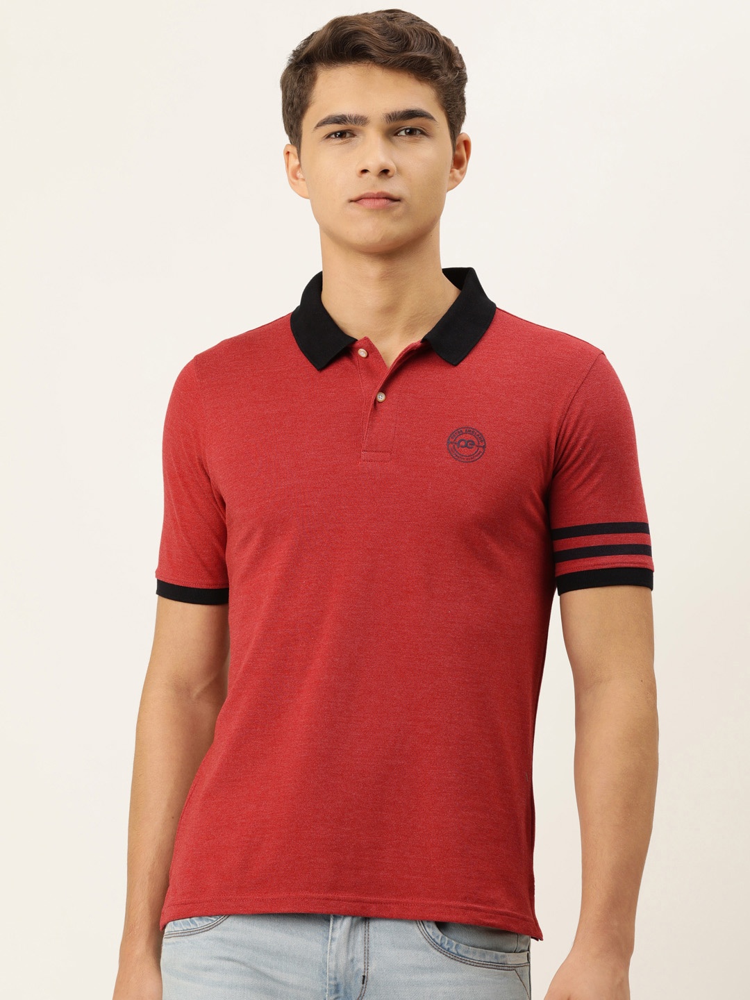 

Peter England Men Red Solid Polo Collar T-shirt