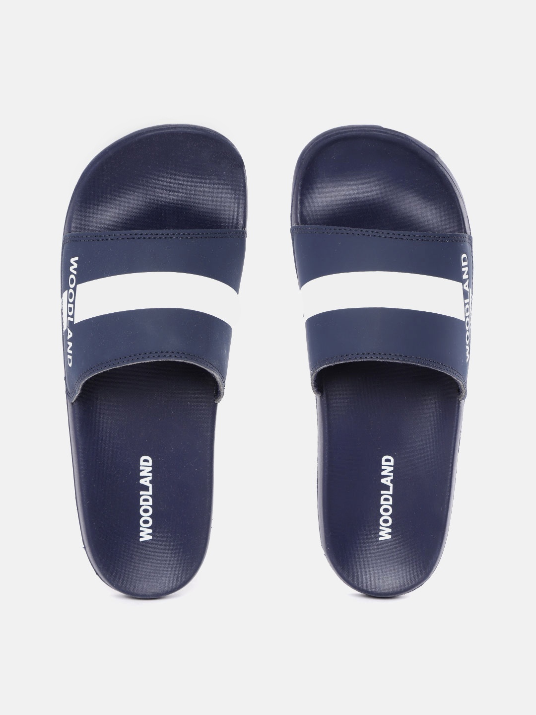 

Woodland Men Navy Blue & White Striped Brand Logo Detail Sliders
