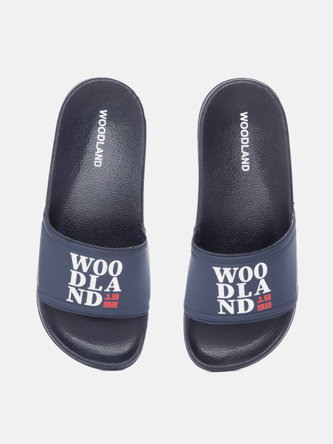 

Woodland Men Navy Blue & White Brand Logo Print Thong Flip-Flops