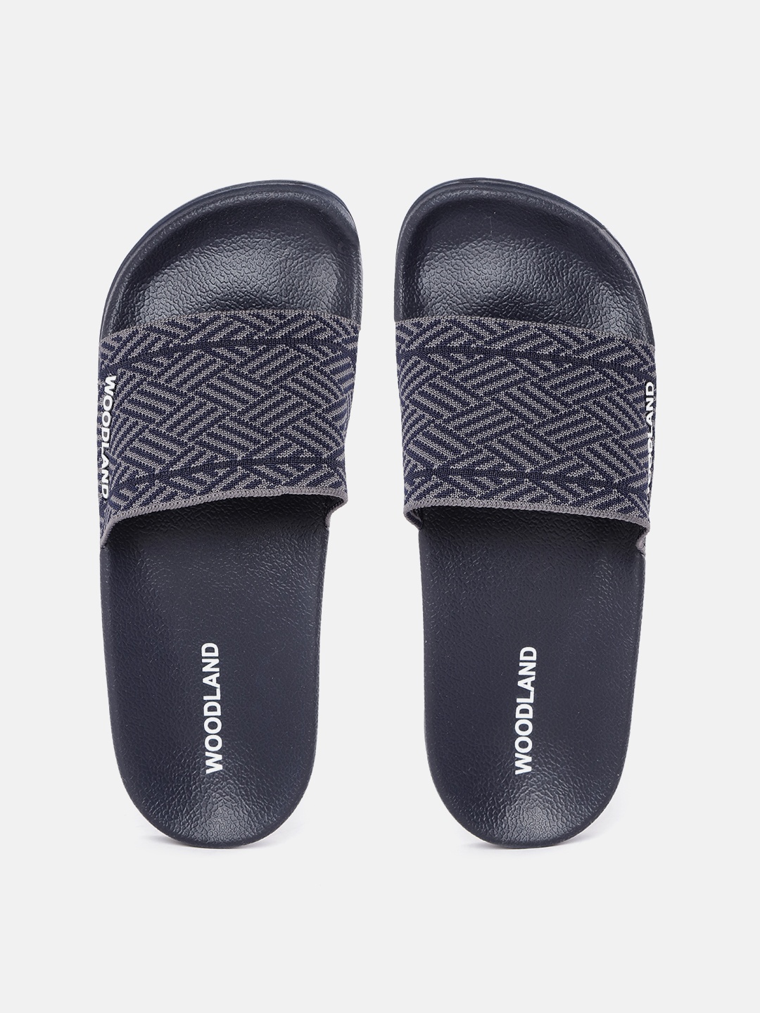 

Woodland Men Navy Blue & Grey Woven Design Sliders