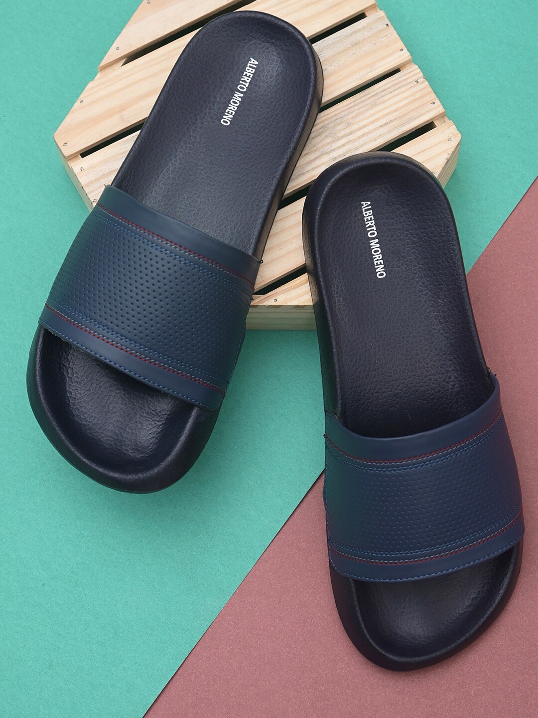 

ALBERTO MORENO Men Blue Solid Sliders