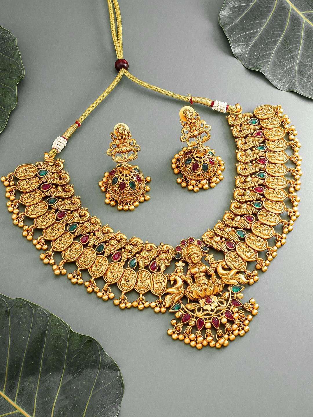 

aadita Gold-Toned Red & Green Stone-Studded Temple Jewelry Set
