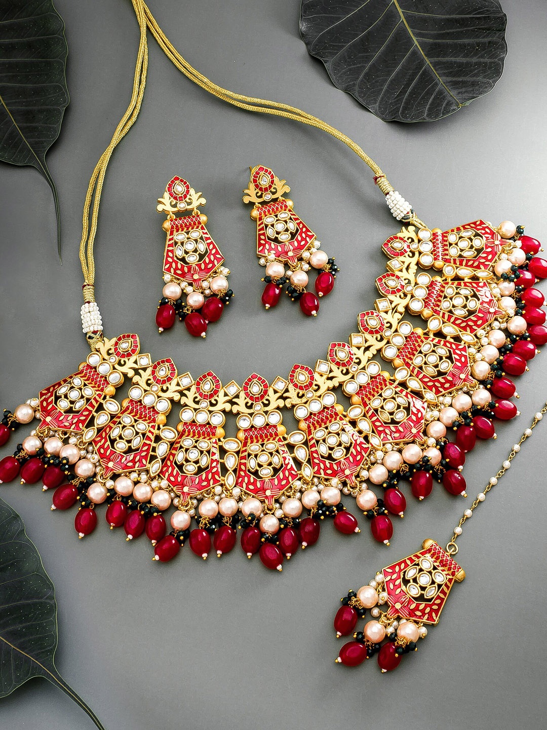 

aadita Women Gold-Plated Kundan Choker Jewellery Set