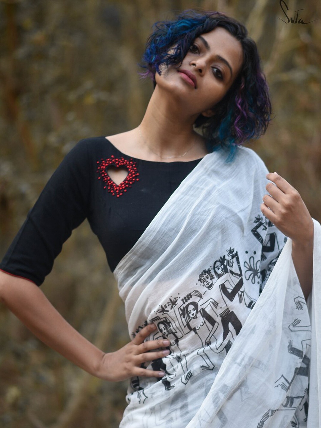 

Suta Black & Red Embroidered Saree Blouse