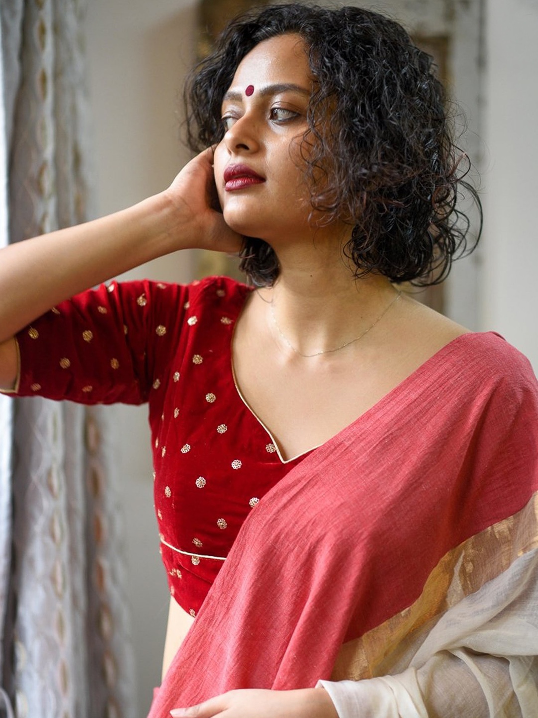 

Suta Maroon & Gold-Colored Embellished Velvet Saree Blouse