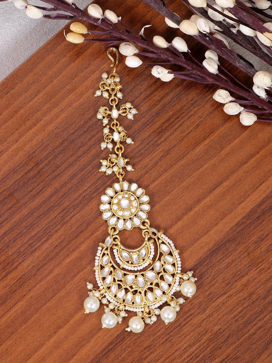 

Crunchy Fashion Gold-Plated & White Kundan Studded Pearl Embedded Maangtikka