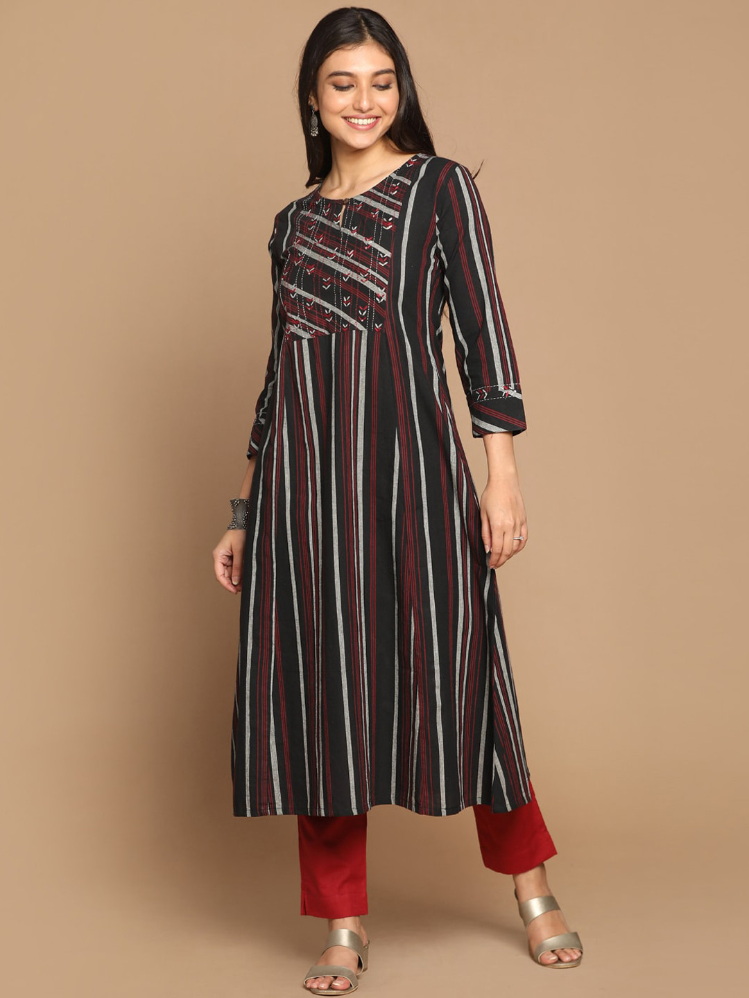 

Earthwear Women Black Striped Cotton A-Line Kurta with Hand Embroidery