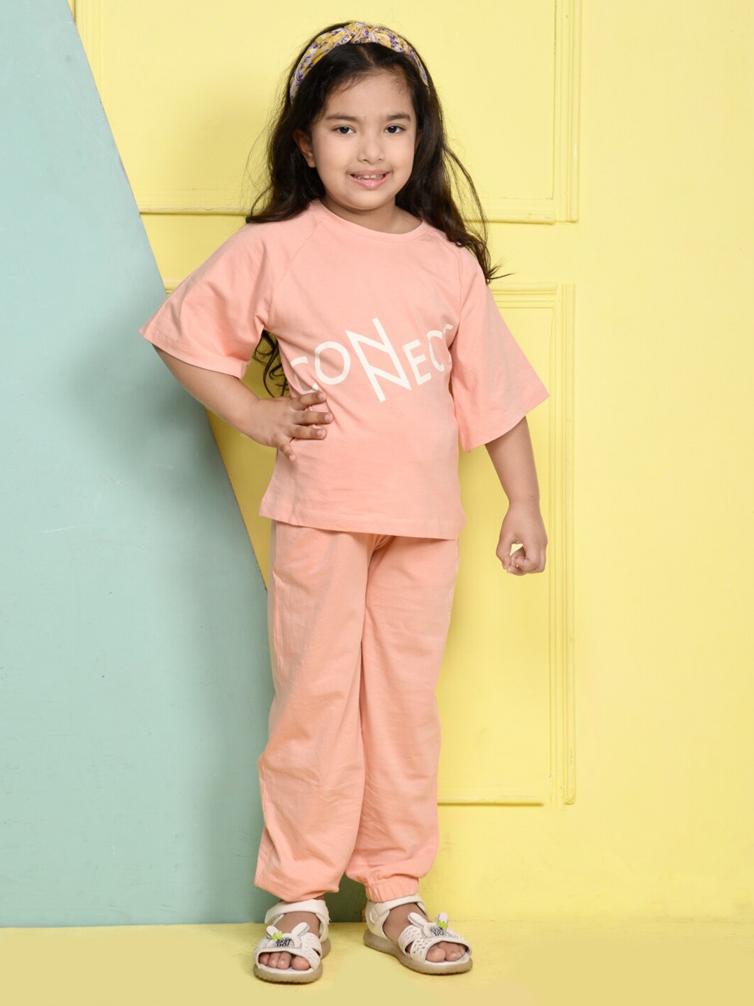 

LilPicks Girls Peach-Coloured Printed T-shirt with Trousers