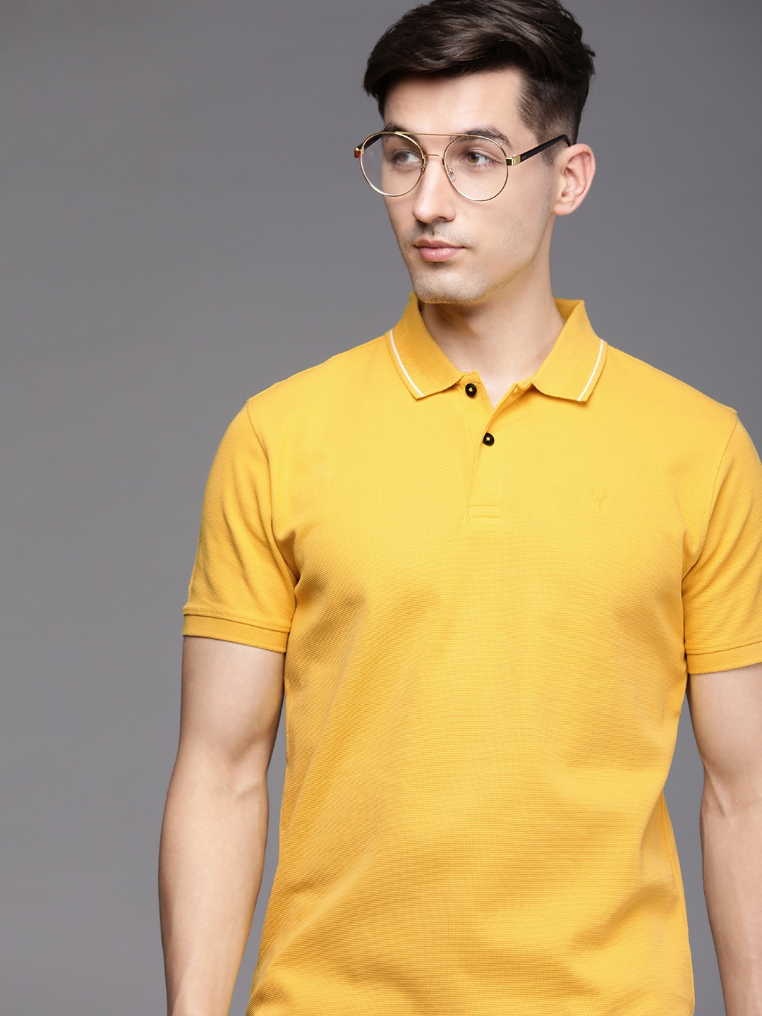 

Allen Solly Men Yellow Self Designed Polo Collar Pure Cotton T-shirt
