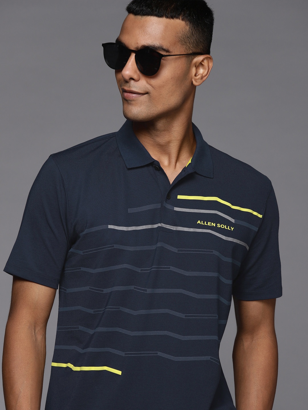 

Allen Solly Men Navy Blue Striped Polo Collar Pure Cotton T-shirt