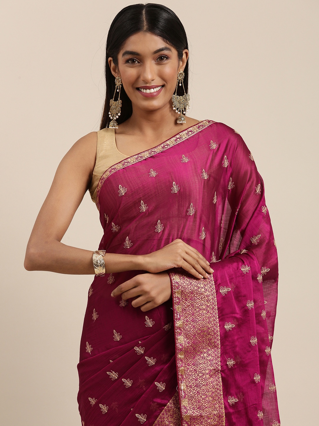 

Shaily Magenta & Beige Ethnic Motifs Embroidered Saree