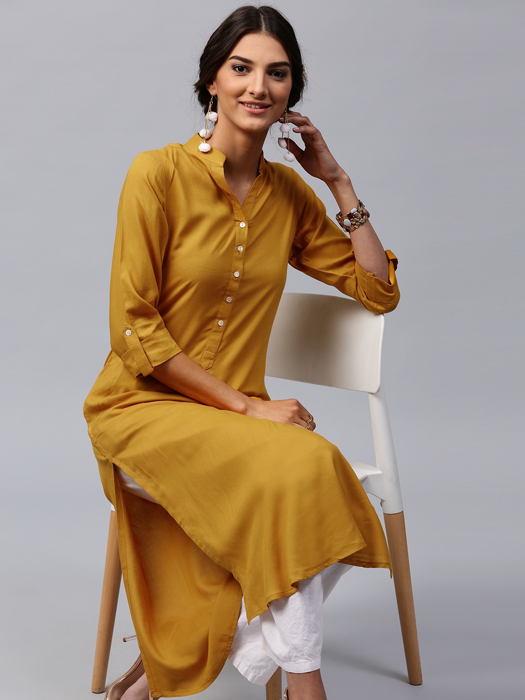 

Libas Women Mustard Yellow Solid Straight Kurta