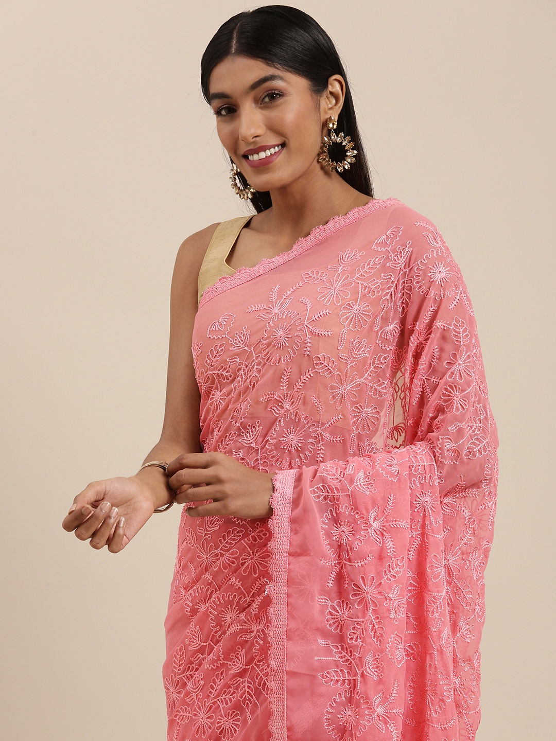 

Shaily Pink Ethnic Motifs Pure Georgette Saree